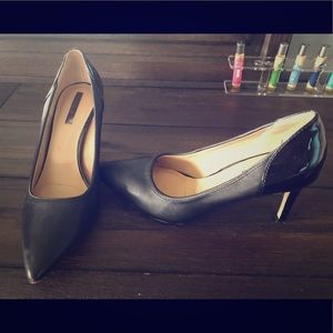 Size 7 black leather Tahari heels worn 3 times.